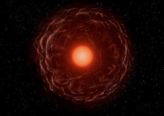 Fantáziarajz egy vörös óriásról. A felfúvodott csillag kiterjedt légköréből az űrbe távozó anyagban jelentős mennyiségű por szintetizálódik, ami az infravörös tartományban detektálható. [Japan Aerospace Exploration Agency (JAXA)]